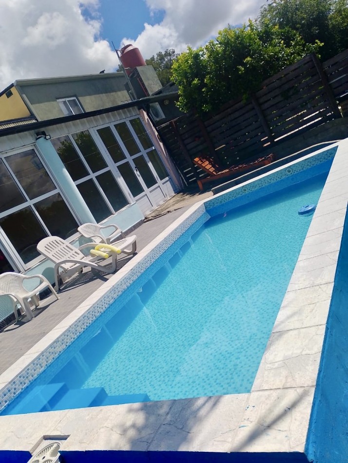 Casa sobre el rio en Helvecia 