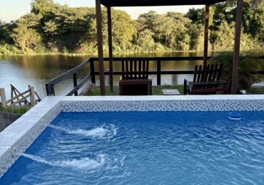 Casa sobre el rio en Helvecia 